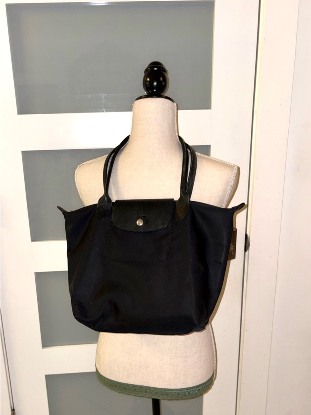 Longchamp this bag is a Le Pliage from the French